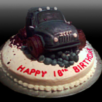 Off Road Jeep Hand carved jeep cake for an off road enthusiast. This cake was made to celebrate his 18th birthday and graduation.