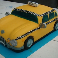 Yellow Cab birthdaycake: yellow cab. taste inside rasberry and tiramisu