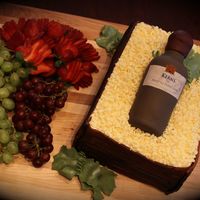 Wine Bottle In A Crate Cake Wine bottle in a crate with real fruit on the side.