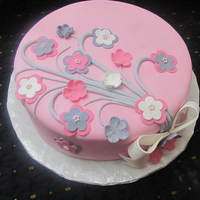 Bouquet Of Flowers had to switch gears and use this 12" round cake for a single cake instead of it being the base of a book cake I was supposed to make....