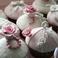 Pink & Silver Romantic Wedding Cupcakes Vanilla cupcakes decorated with fondant details