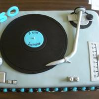 1317514326.jpg A local bakery did this cake and my cousin loved it so much I replicated it for her. Her boyfriend, the love of her life, is a part time DJ...