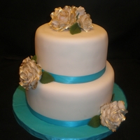 Roses 8 and 6 inch cake with handmade roses from gumpaste
