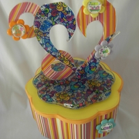 Funky Love Cake This cake is Icing Images suspended in Isomalt. Enjoy!