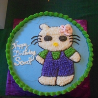 Hello Kitty For Scout! This was our first Hello Kitty cake. The customer didn't want any fondant so it's all buttercream.