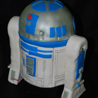 R2D2 Cake I made this for my son's birthday!! The body is white cake with butter cream icing covered in fondant and the legs are Styrofoam...