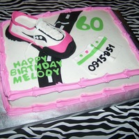 Marathon Birthday Cake 11x15 sheet with running shoe and marathon accents...iced in buttercream with fondant accents - the shoe is rice krispie treat covered in...