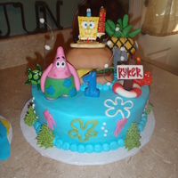 Spongebob Themed Birthday Cake! Iced in buttercream with fondant accents! All is edible except Spongebob, he is a candle!
