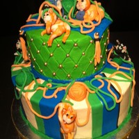 Kitty At Play Cat lover cake dream. Kitty, kitty, playing and having fun. Top tier buttercream, Bottom buttercream with fondant strips. Gumpaste kittens...