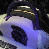 Purse Cake My first purse cake. Indydebi buttercream made it delis, then covered in fondant. The decoration are Linda McClure's gumpaste and...