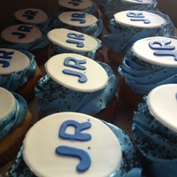 Vanilla Cupcakes With Vanilla Swiss Buttercream Toppers Made Out Of Gum Paste Vanilla cupcakes with vanilla Swiss buttercream toppers made out of gum paste