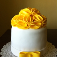 Ruffle Flower Cake I just wanted to try the ruffle flowers on a cake, this is the result. Thank you Jessicakes for the tutorial.