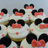 Minnie Mouse Cupcakes Inspired by SO many of the ones I saw on here, these are my own little version. White cake with Vanilla BC. All Satin Ice fondant...