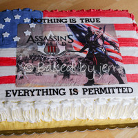 Assassin's Creed 3 Birthday Cake Simple sheet cake with an Assassin's Creed 3 theme. White cake with vanilla buttercream. Found the picture online and had it printed...