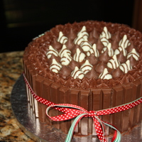 A Christmas Kiss I saw this cake on here many times and always wanted to do one. I don't know who is the orginial poster, but thanks for the idea.This...