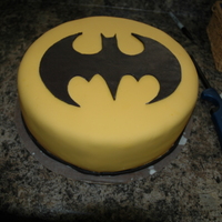 Batman Bat Symbol Cake I made this cake for my son's 5th birthday party. It was also my second fondant cake ever, so I kept it simple:)