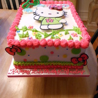 Kitty Cake Hello Kitty and bows are made using Color Flow by Wilton. Disco dust added to one bow. She's elevated on sugar cubes (have used...
