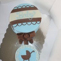 Baby Boy Rattle Nothing fancy here...customer wanted white cake with vanilla buttercream frosting covering and filling the cakes. Fondant accents and...