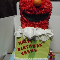 Elmo Cake This cake was made out of Yellow cake with French Vanilla buttercreme....I thought I had done the right thing because I used a really long...