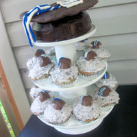 Graduation Cupcakes With Graduation Hat Cake for my brother's college graduation. cupcakes are cookies and cream with rolo and dove chocolate candy hats. Graduation hat topper is...