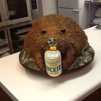 Nutria Groom's Cake The groom and friends go nutria hunting every year. The bride provided a photo of a nutria he killed and posed with a beer can. The cake...
