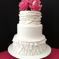Round Wedding Cake W/ Sugar Peonys My first attempt at frilling and the gathering on the top. I saw a picture like it on CC