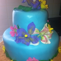 Luau Themed Cake Luau themed 60th Birthday Party. MMF flowers