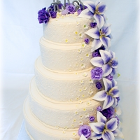 Wedding Cake With Purple Flowers 
