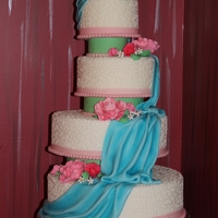 1St Competition Spring Theme I made this with the idea of having each tier off center with a waterfall flowing down the cake.