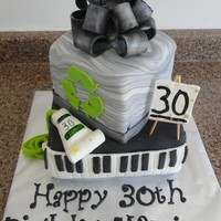 30Th Birthday Cake This was for a man turning 30. The cake was suppose to be a representation of all his interests. He likes art, the piano, food, his dogs,...