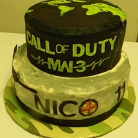 Call Of Duty Mw3 Call of Duty MW3 cake for 11 year old boy's birthday. Yellow cake colored to look like camouflage with buttercream icing. Sugar sheets...