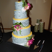 David & Kayla Layers of key lime cake & lemon cake all with vanilla buttercream. Gumpaste ranunculas, hens & chicks, mini carnations, gelatin...