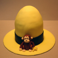 Curious George And The Yellow Hat Alternating layers of vanilla and chocolate cake with buttercream filling, covered in fondant, with fondant/gumpaste George sitting on the...