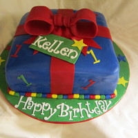 1St Birthday Cake 10" chocolate cake with cookies and cream filling. The weather was so humid when I was making this the fondant was very difficult to...