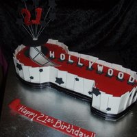 Hollywood 21St Cake Made in my decorating course-- we were practising making panels with fondant and gum trag as well as covering a shaped cake.It was a dummy...
