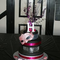 Hayley's 21St Masquerade Cake I had a friend request a copy of a cake i had previously designed, with the only difference being she wanted a mask theme instead of...