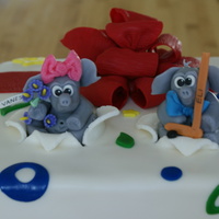 Double Shower This was a cake made for girls at work that had their babies around the same time. Cake is chocolate with hazelnut SMBC, covered in fondant...