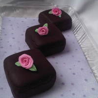 Mini Cakes This is my first try at roses and mini's. It wasn't so simple crumb coating them. I'm happy with the roses for it being my...