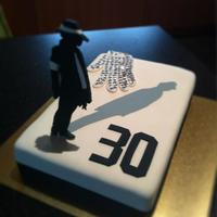 Smooth Criminal Cake Thanks for the Kudos. It's a vanilla butter cake covered in Satin Ice. I made the figure by getting a pic of the net and laying it...