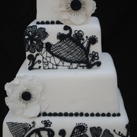 Black & White Piped Lace & Anemones I have been wanting to try the piped lace effect for a while, so came up with this design for a dummy cake. Piping in black RI (I used the...
