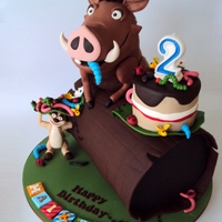 Hakuna Matata! Pumba And Timon Pumba and Timon are sculpted from Rice Krispie Treast and decorated with Gumpaste, the Log is all cake. With a Gumpaste Bug decorated Smash...