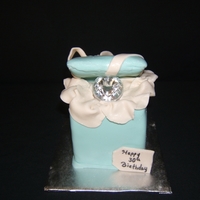 Tiffany Box Birthday Cake Tiffany box birthday cake. Both cakes are strawberry cake with strawberry filling. Toy ring in small cake box.