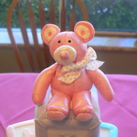 Pink Baby Bear Blocks Bear made form fondant/ gumpaste and pink luster dust. Blocks are wood covered in fondant.