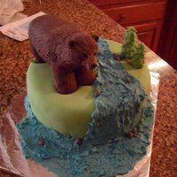 Bear Cake Bear is made of rice krispies and covered in fondant.