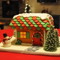Gingerbread House Cake This was a cake I made last year for Christmas, with some modifications from the original. All details are made out of fondant, royal icing...