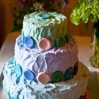 Button Wedding Cake This cake was a buttercream cake with colored white chocolate buttons.