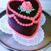 Valentine's Day Heart This cake was a devil's food cake covered in dark chocolate ganache and buttercream decorations.