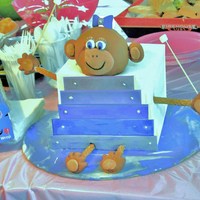 Baby Monkey Playing The Xylophone This cake was a carrot cake with cream cheese frosting. The decorations are all fondant, with silver dragees as the screws for the...