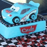 Dinoco Lightning My sister and I made this for my son's birthday. Lightning is carved out of cake, and we used the buttercream flavored MMF recipe from...