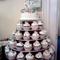 Lily Bridal Shower Cupcakes My cousin wanted lily's tipped with red. Made 70 cupcakes with 70 fondant lily's everything edible. Her mom wanted her to have a...
